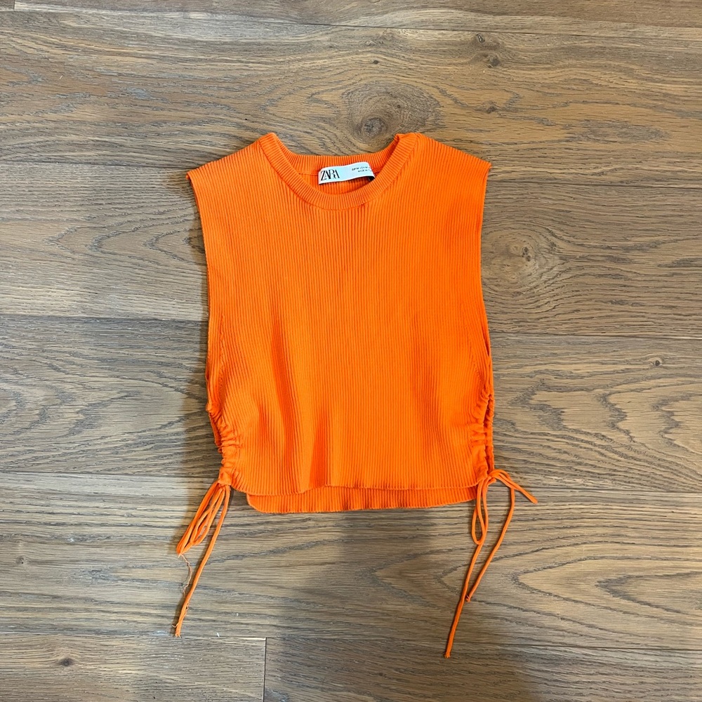 Orange knit top